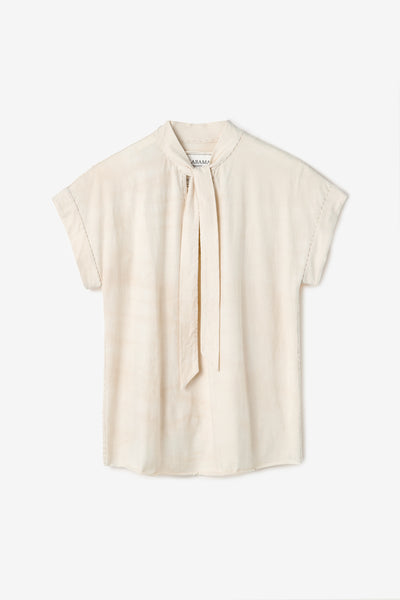 The Clover Top, a dolman sleeve shirt with a straight fit and keyhole neckline with bow closure in Tea.