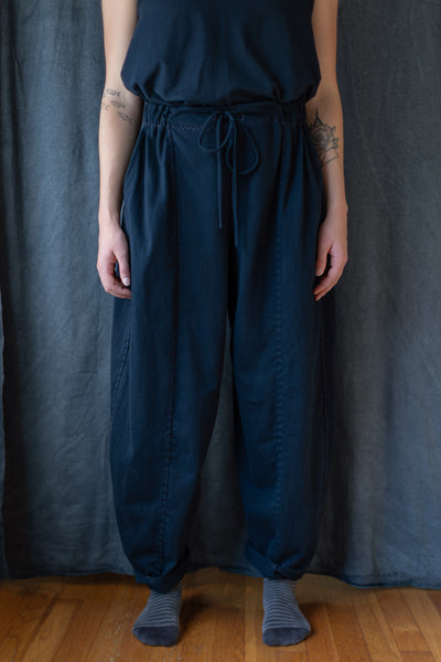 Zeta Pant in Navy on Model. Shown full length.