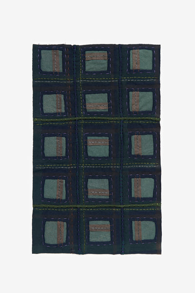 Alabama Chanin fabric swatch of hand-sewn plaid pattern in navy