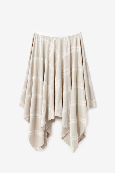 The Tristan Skirt with handkerchief hem and hand-painted plaid in sand