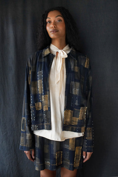 Model wearing the Silva Jacket and Lynx Skirt.