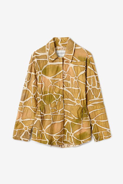 The Vireo Jacket, a long sleeve relaxed fit jacket with shirring at waist and mosaic design in gold.