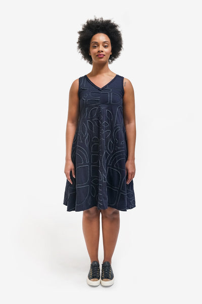 Model wearing the A-Line Dress in Navy with Abstract design.