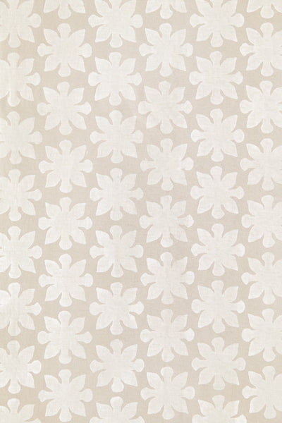 Wax fabric painted with the Tessellation design in white paint. Fabric is shown unfolded.