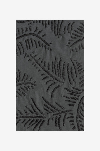 Fabric swatch featuring the Fern design on Charcoal fabric.