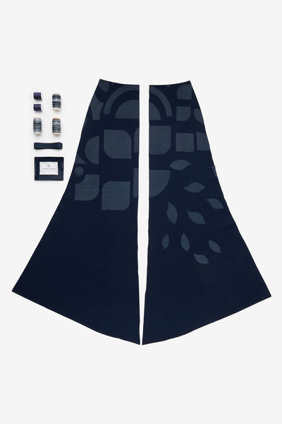 Kit contents of The Abstract Placement Long Fitted Skirt in Navy.