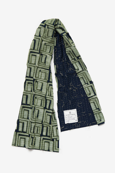 The Slim Scarf with Small Sonia negative reverse appliqué in Verdant and Navy.