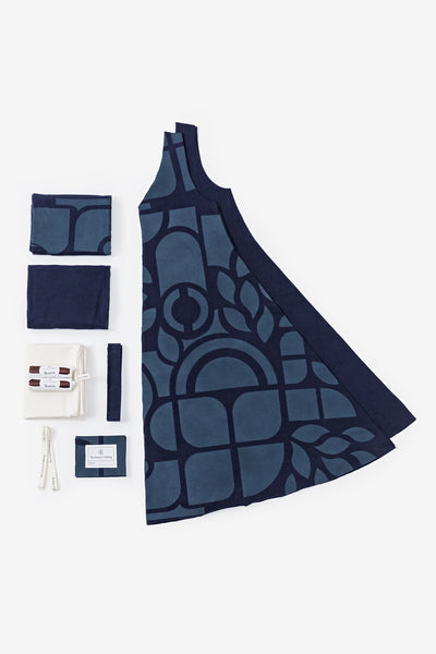 Contents of the A-Line Dress Kit with Abstract design in Navy, shown with pre-cut fabric and thread.